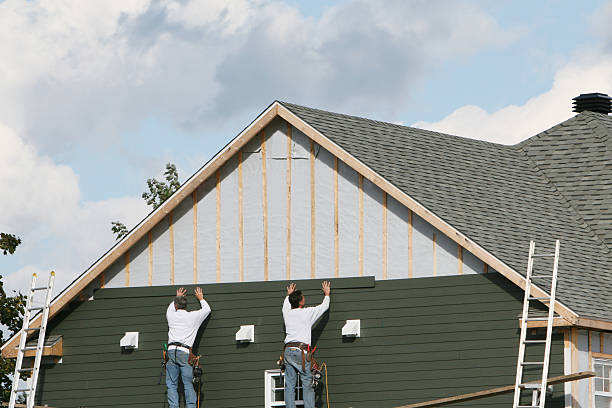 Professional Emergency Siding Repair technician working in Moores Hill, IN